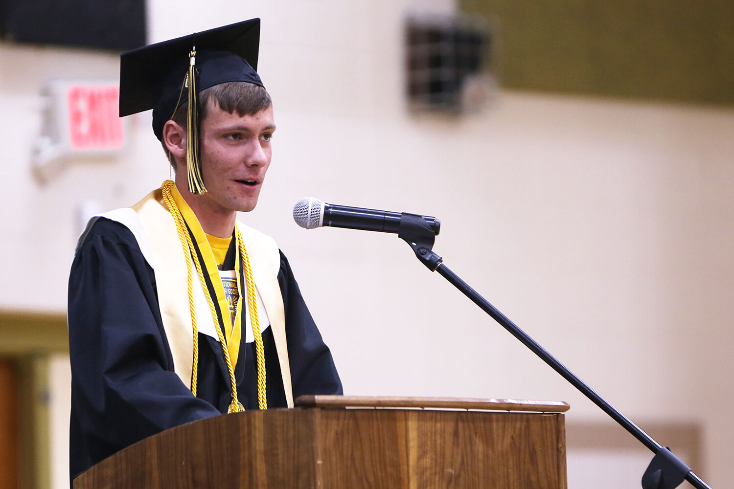 Massimo Haas welcomes friends, family and classmates as he kicks off the student speeches